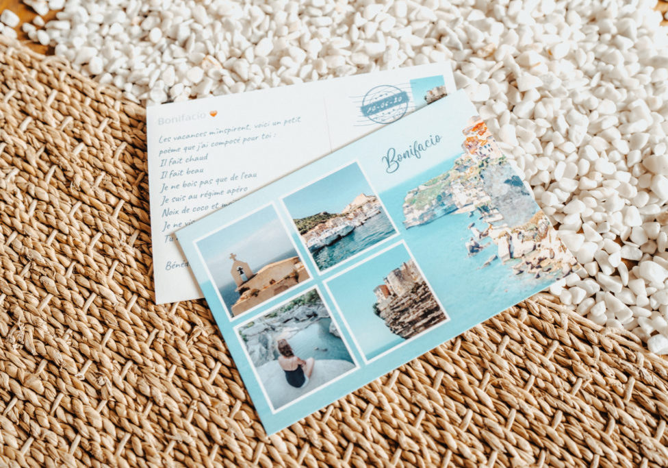 Bonifacio postcard with wicker carpet and white pebbles