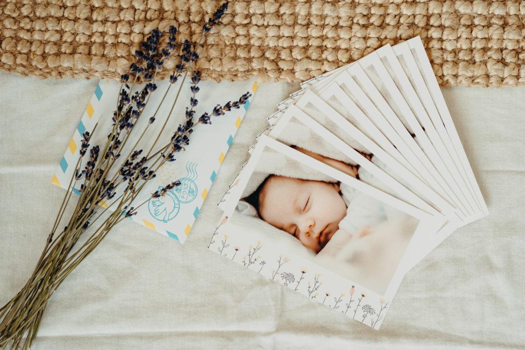 set of birth announcement cards with flowers