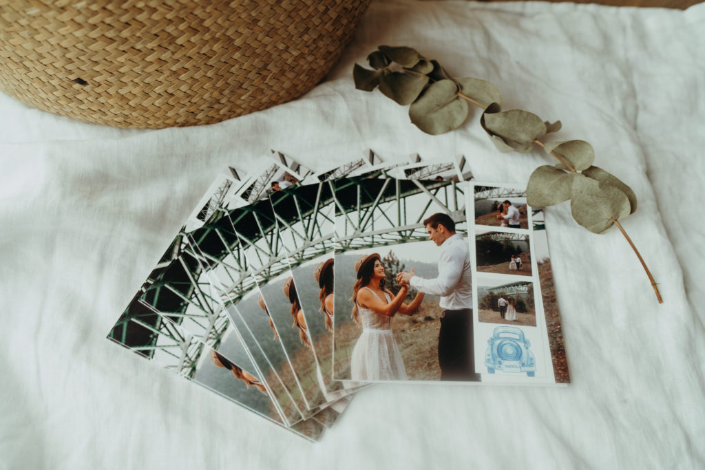stack of wedding cards with bridge and ladybug