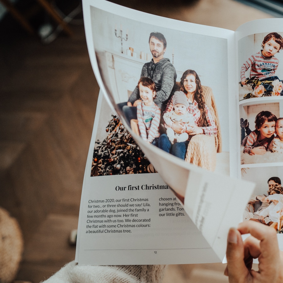 hand leafing through personalized family diary